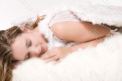 Beautiful relaxed angel in the clouds Beautiful relaxed angel in the clouds