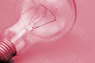 Background with lit lightbulb