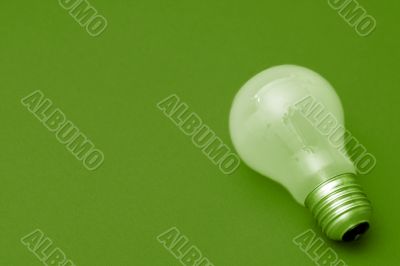 Background with lit lightbulb