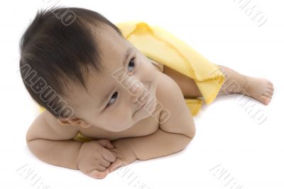 Sweet baby with a yellow blanket