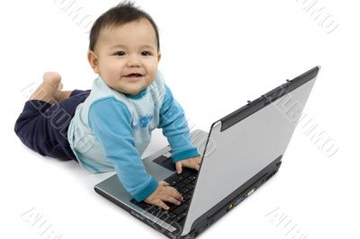 sweet baby with laptop