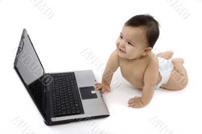 sweet baby with laptop