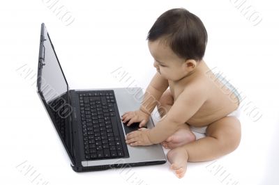 sweet baby with laptop