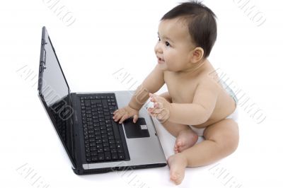sweet baby with laptop