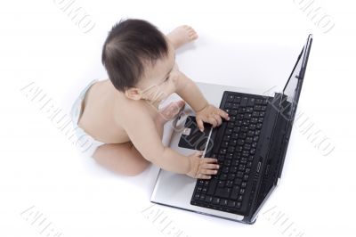 sweet baby with laptop