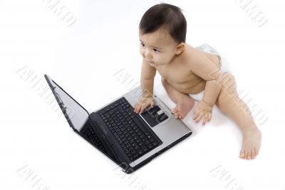 sweet baby with laptop