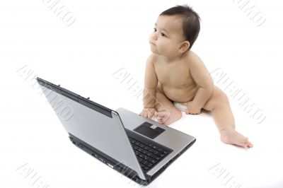sweet baby with laptop