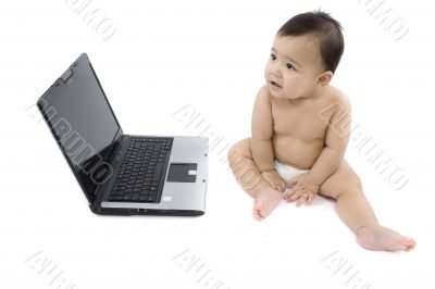sweet baby with laptop