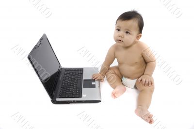 sweet baby with laptop