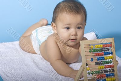 Sweet baby with a ball machine