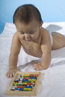 Sweet baby with a ball machine