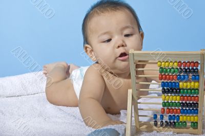 Sweet baby with a ball machine