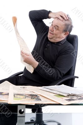 Senior read newspaper