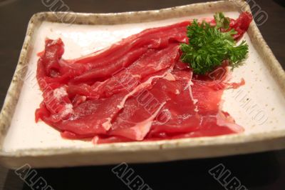 Sliced raw beef