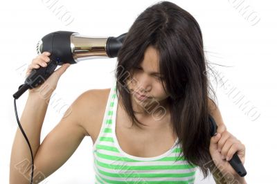 Teenager with hairdryer