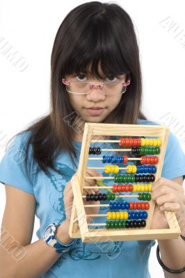 Teenager with calculator