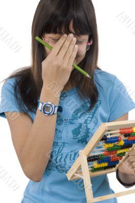 Teenager with calculator