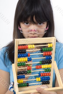 Teenager with calculator