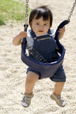 Baby on a swing