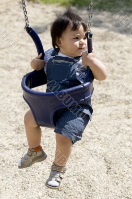 Baby on a swing