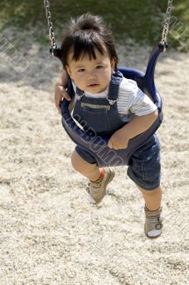 Baby on a swing