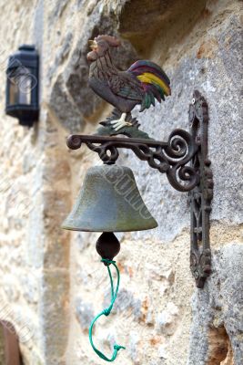 Handbell with the cock