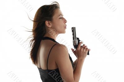 young woman with revolver isolated on white background