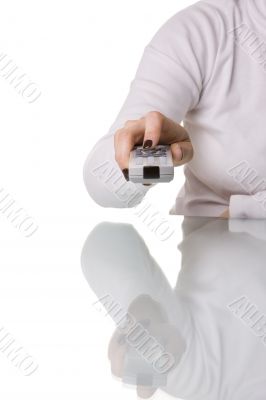 woman holding a remote control
