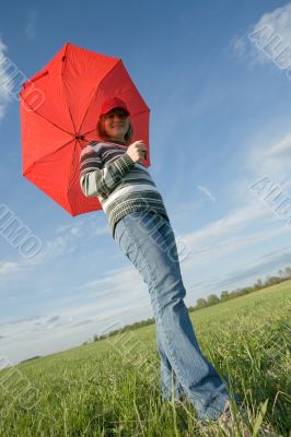 woman under red umbrella