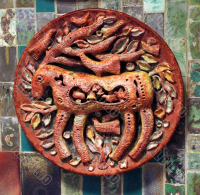 Decorative ceramic dish on a wall