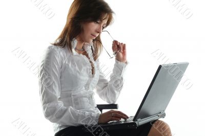 business woman working at laptop isolated on white background