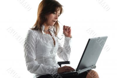 business woman working at laptop isolated on white background