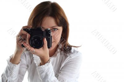 young woman with old camera isolated on white background