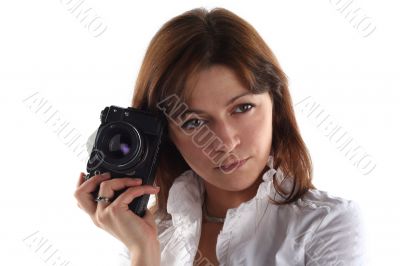 young woman with old camera isolated on white background