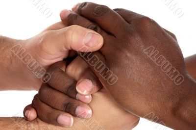 African and caucasian male shaking hands