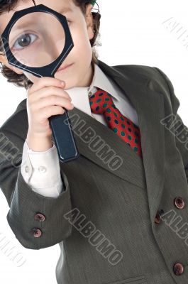 Kid with magnifying glass