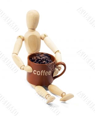wood mannequin and coffee