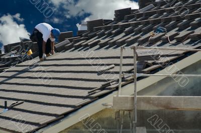 Roofer Laying Tile