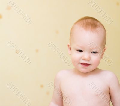 Enjoying baby stand on bed