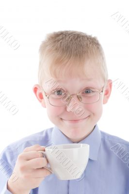 Boy enjoying a nice warm cup of coffee