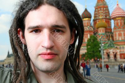 Young man with dreadlock hair.