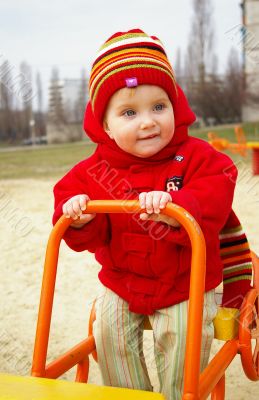 Girl drive on a swing