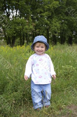 Girl on a background of a landscape