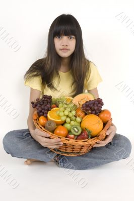 Teenagers with fruit basket