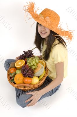Teenagers with fruit basket