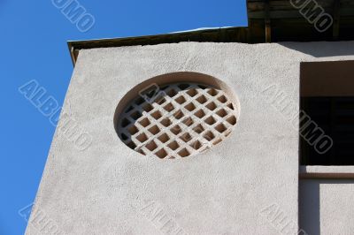 Concrete wall with a grid.