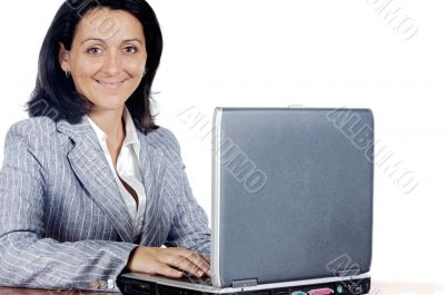 Woman working on a laptop computer Woman working on a laptop computer