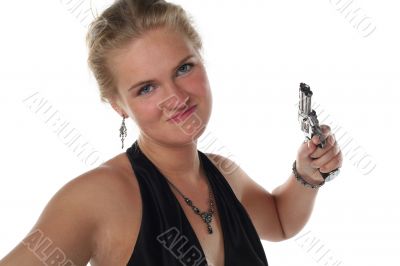 young blond woman in black dress with revolver isolated on white background