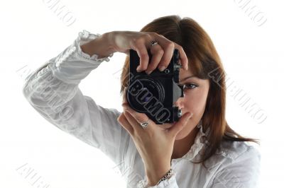 young woman with old camera isolated on white background