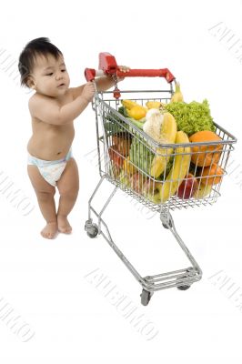 Baby pushes a shopping cart